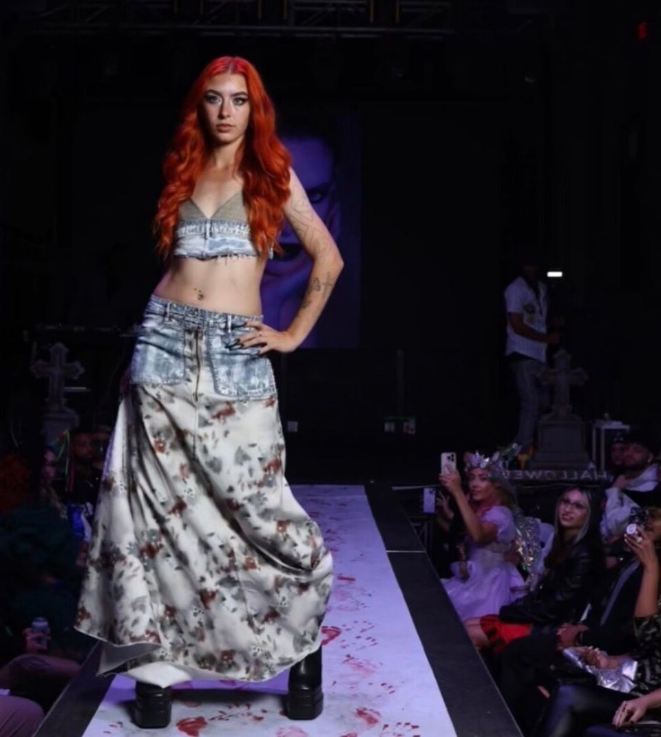 A model on the runway during LuxeArt's Moda Magic Halloween show